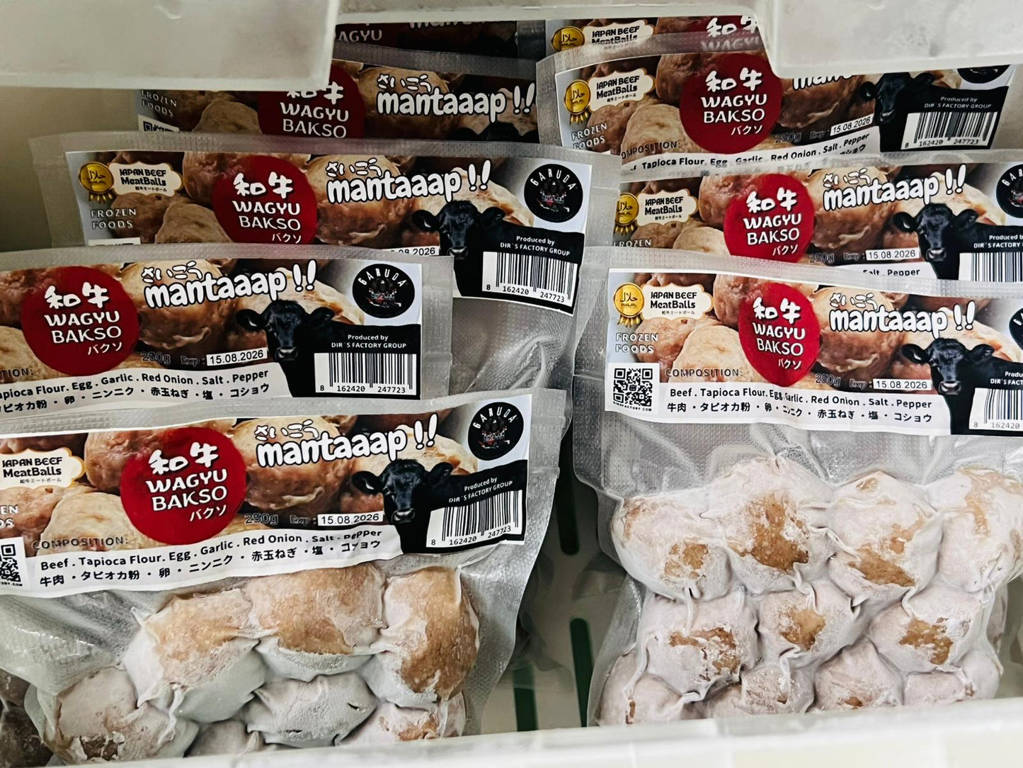 Packages of Wagyu Bakso with visible branding and text.